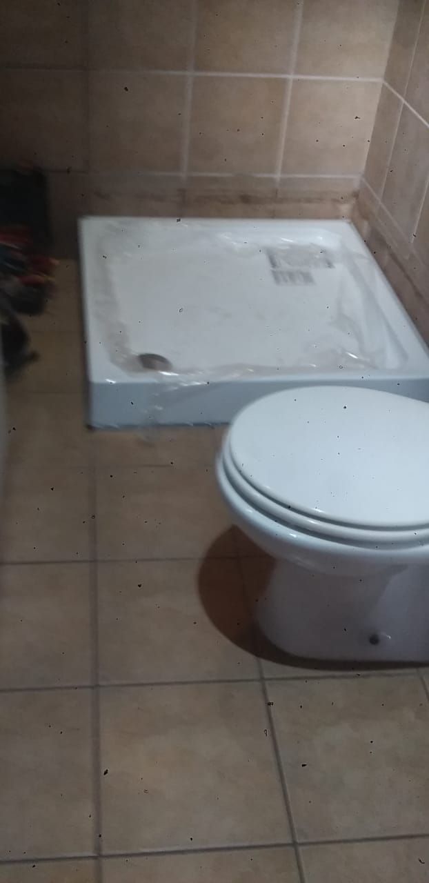 Bathroom plumbing and shower tray installation